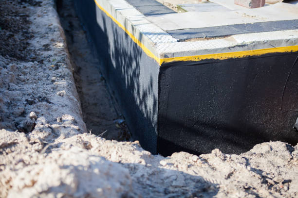 Professional Waterproofing technician working in Bear Creek, WI